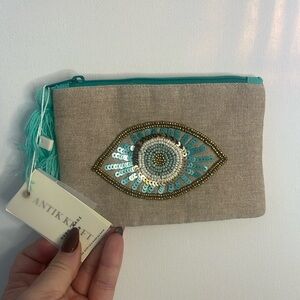 Beaded evil eye pouch. NWT.